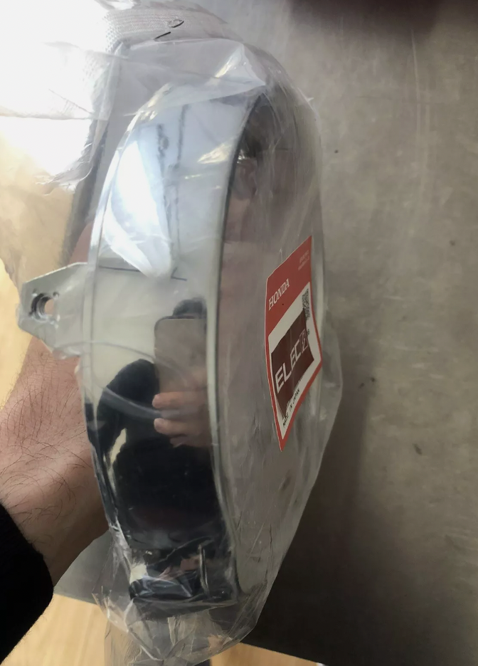 Chrome de phare neuf d'origine Honda Dax