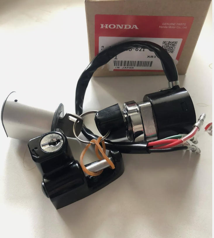 neiman et la serrure de selle neuf d'origine Honda dax