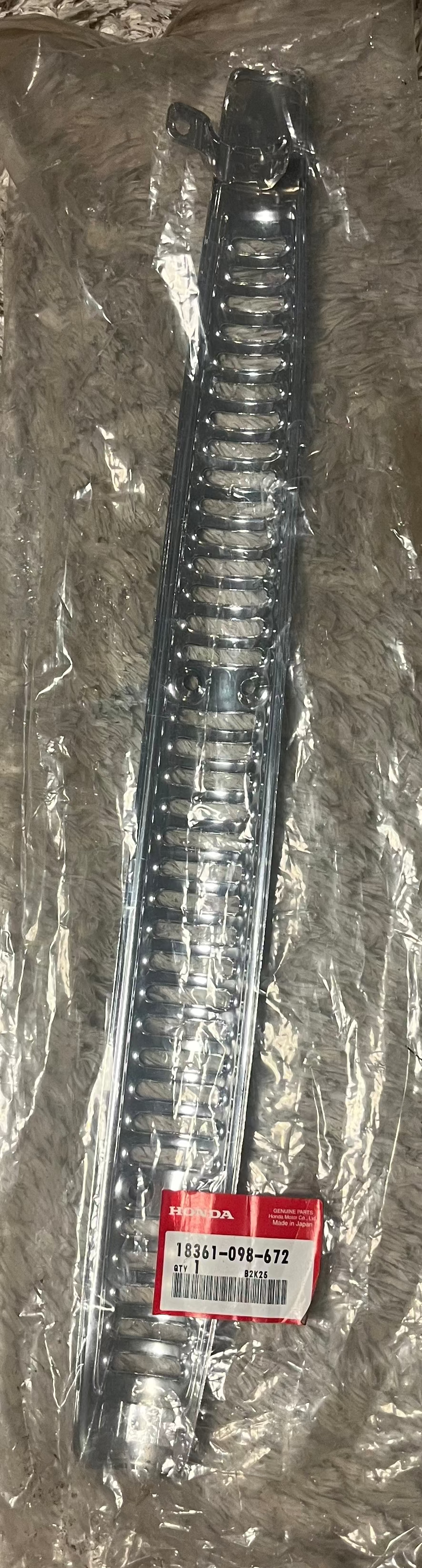 Honda Dax – Cache Pot d’Échappement d’Origine