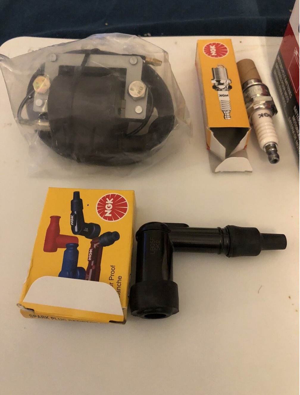 Kit allumage ( Batterie, rupteur et le condensateur, bobine refabrication, bougie, antiparasite)